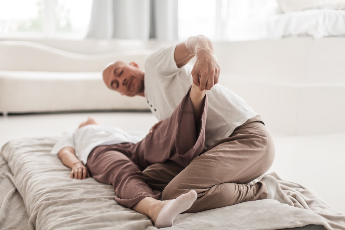 Man performing yoga pose demonstrating flexibility
